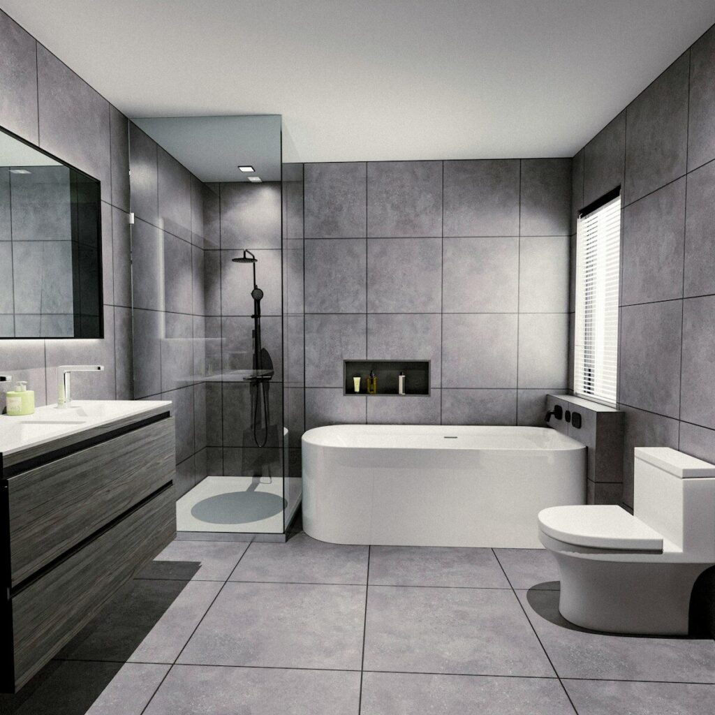 Modern bathroom with bathtub, shower, and vanity.